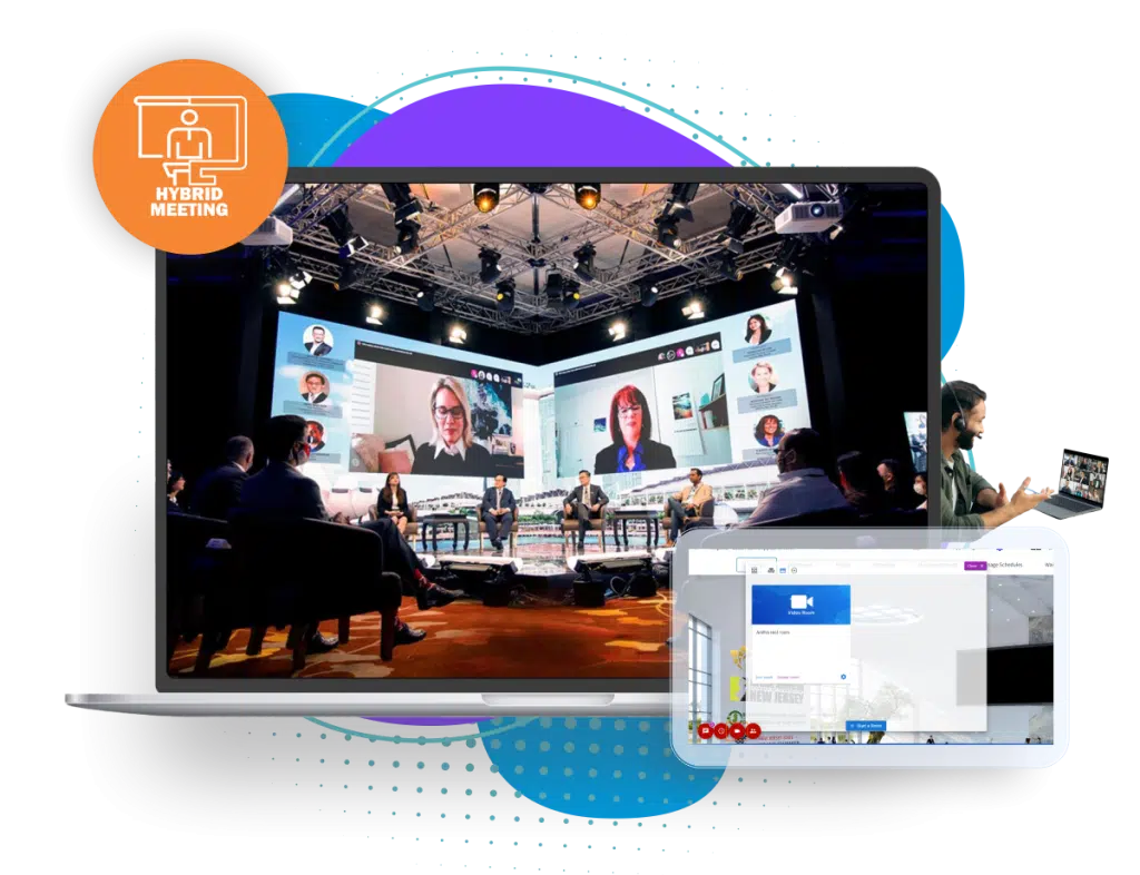 A panel on stage with remote speakers on screen, shown in a hybrid event platform